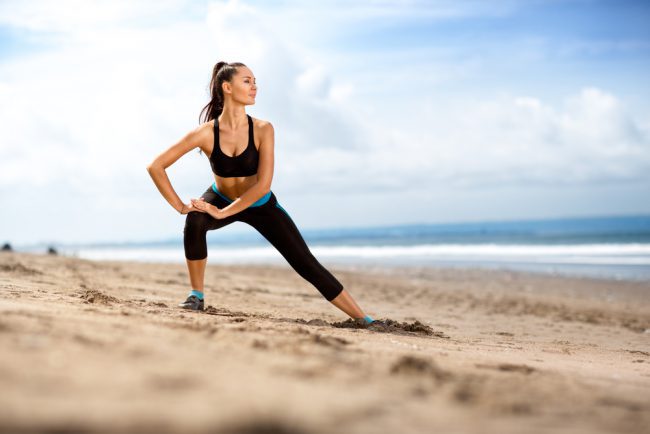 Leg Stretches On The Beach